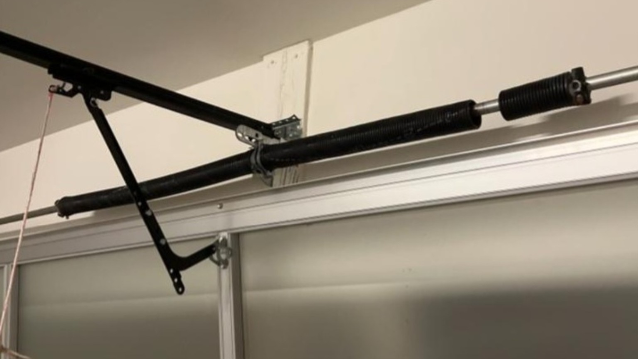 Broken garage door spring replacement